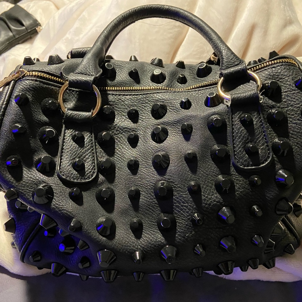 Traci Lynn large black leather purse with studs